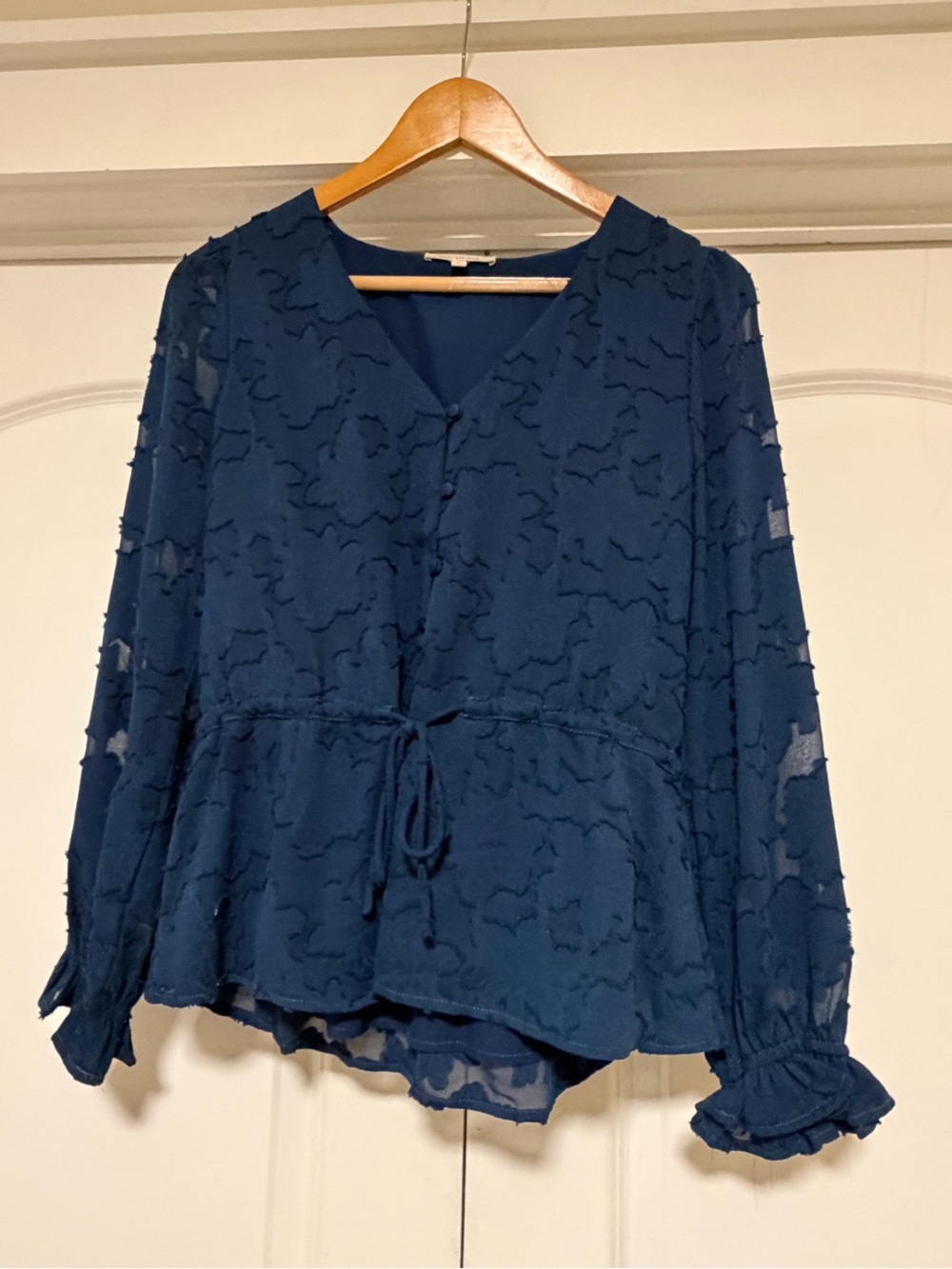 Skies Are Blue Navy Textured V-Neck Peplum Blouse with Drawstring